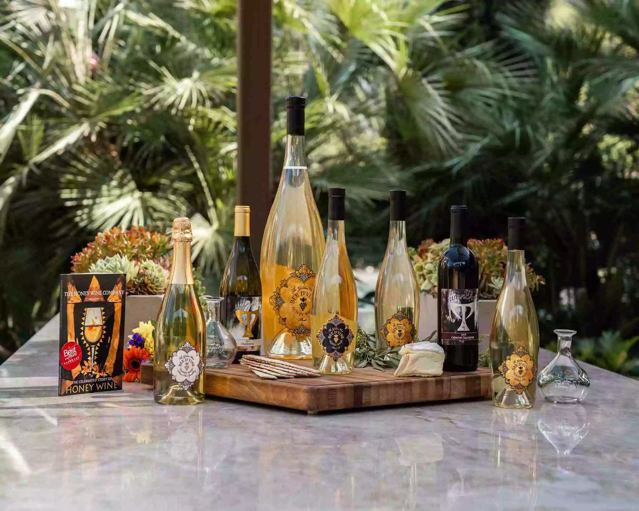 Collection of all wines in the produced by the Honey Wine Company plus book and berele flasks