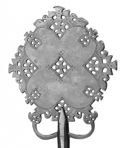 Ethiopian cross from Axum with natural elements of birds and flowers  that inspired the Bee d'Vine wine label